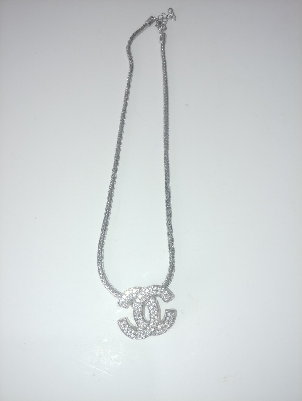 Designer-Inspired Silver Crystal Interlocking Pendant Necklace - Picture 4 of 8